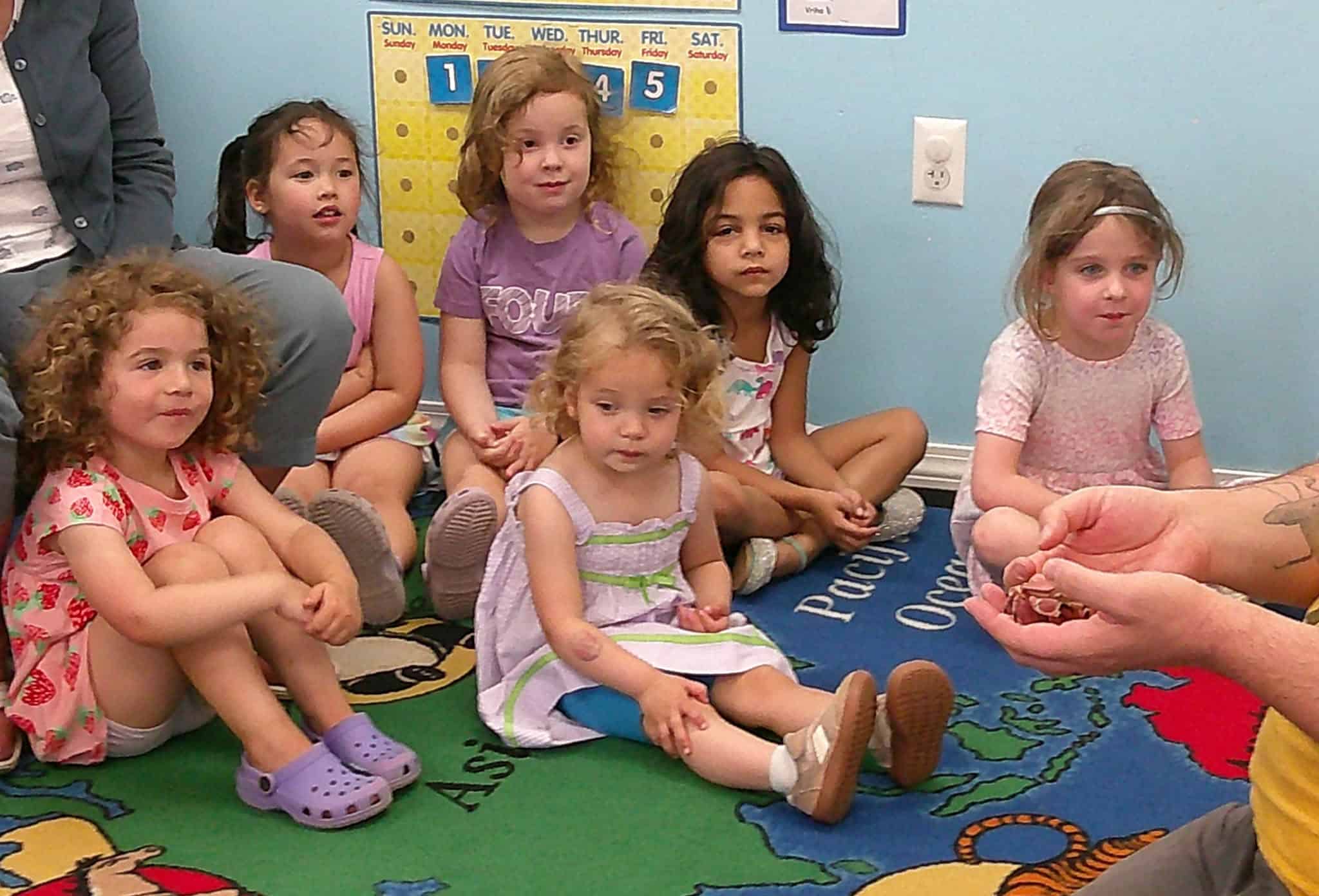 Preschoolers engaged in play-based learning in the Butterflies classroom at Boxboro Children Center