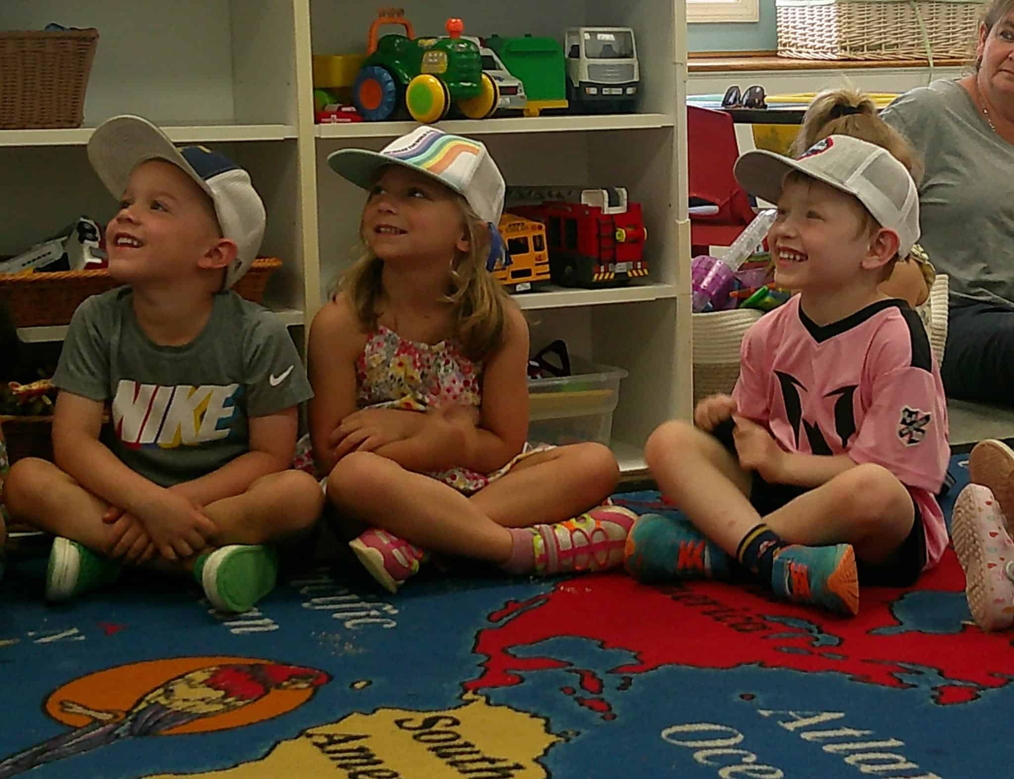 Pre-K children in hands-on learning activities in the Dragonflies classroom at Boxboro Children Center
